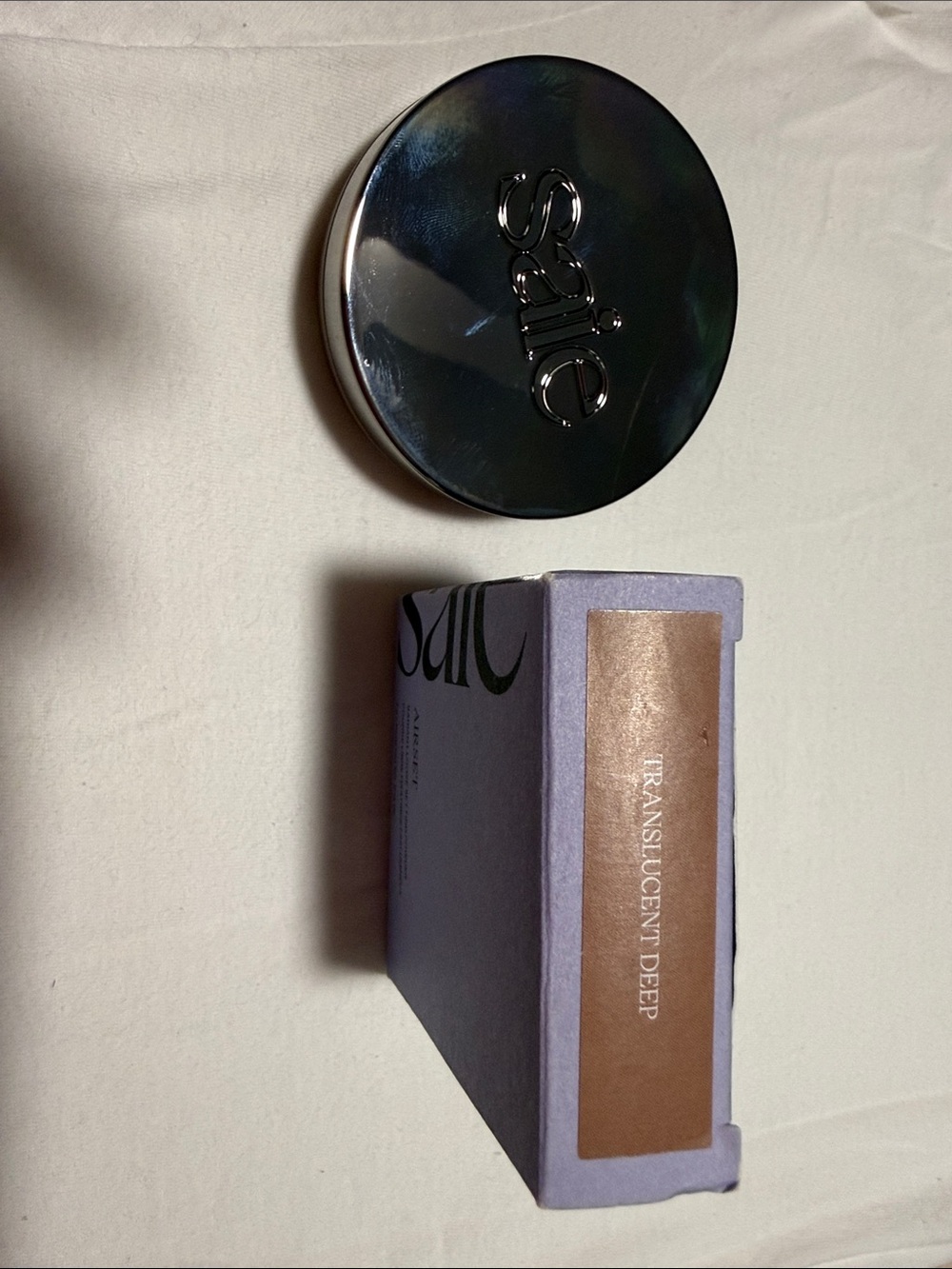 Saie Translucent Deep Powder Compact — Bronze
